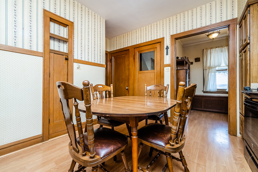 2933 Maple Avenue Berwyn, IL 60402 - Photo 28 of 49 a view of a dining room with furniture and wooden floor