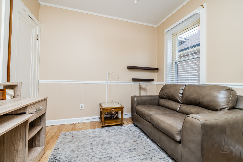 2933 Maple Avenue Berwyn, IL 60402 - Photo 33 of 49 a living room with furniture and a fireplace