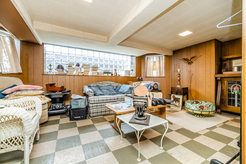 2933 Maple Avenue Berwyn, IL 60402 - Photo 41 of 49 a living room with furniture a rug and a large window
