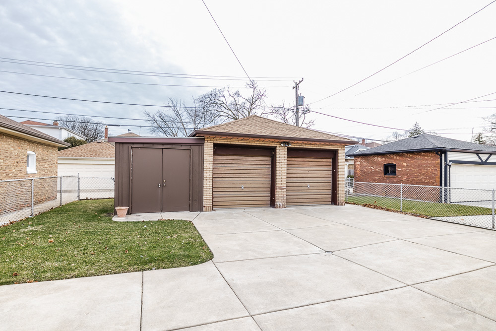 2933 Maple Avenue Berwyn, IL 60402 - Photo 48 of 49 a house with yard in front of it