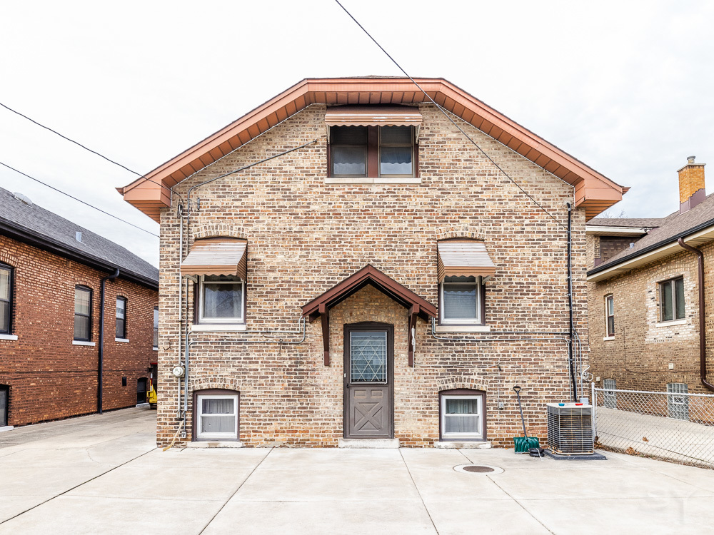 2933 Maple Avenue Berwyn, IL 60402 - Photo 49 of 49 a front view of a house with a yard