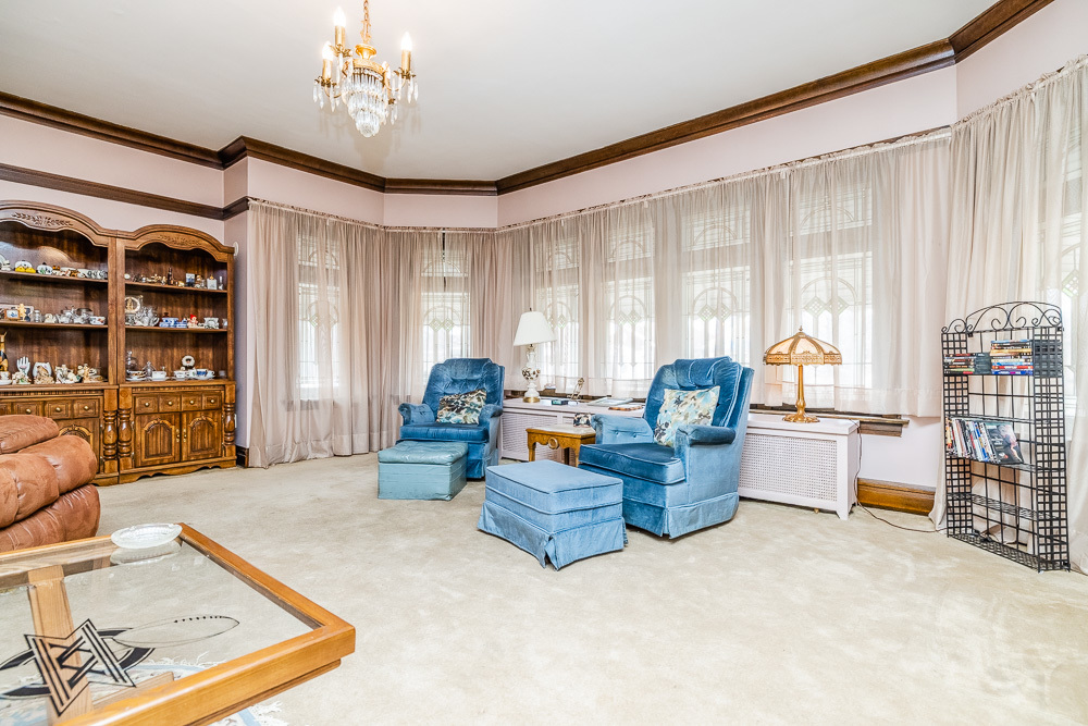 2933 Maple Avenue Berwyn, IL 60402 - Photo 5 of 49 a living room with furniture and a large window