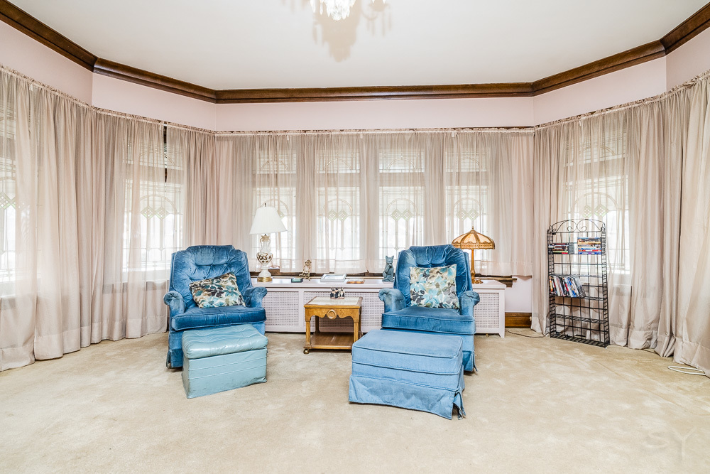 2933 Maple Avenue Berwyn, IL 60402 - Photo 6 of 49 a living room with furniture and a large window