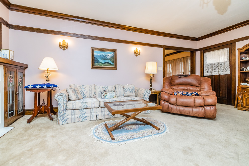 2933 Maple Avenue Berwyn, IL 60402 - Photo 7 of 49 a living room with furniture and a flat screen tv