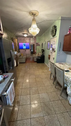 a view of a livingroom with furniture and a fireplace
