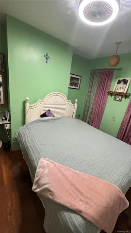 a bedroom with a bed and a sink