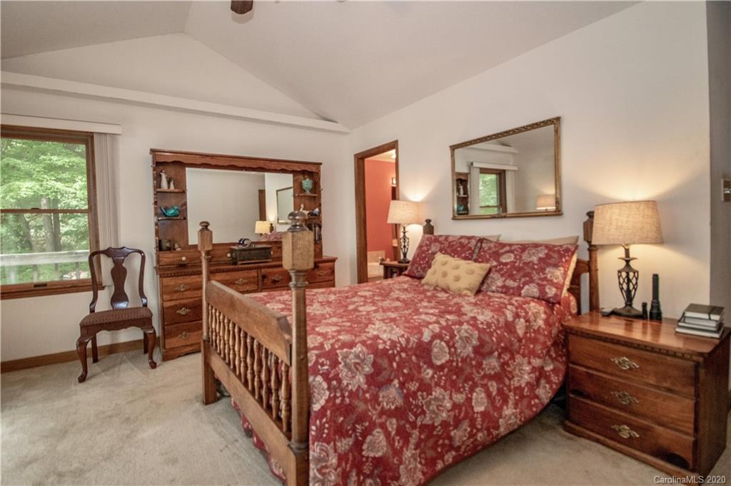 8869 Holdsclaw Road Terrell, NC 28682 - Photo 15 of 37 a bedroom with double bed and a window