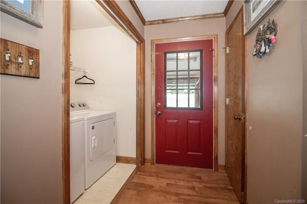 8869 Holdsclaw Road Terrell, NC 28682 - Photo 18 of 37 a view of a bathroom from a hallway