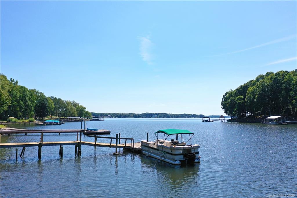 8869 Holdsclaw Road Terrell, NC 28682 - Photo 3 of 37 a view of a lake with outdoor seating space