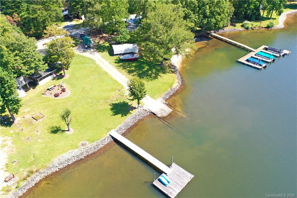 8869 Holdsclaw Road Terrell, NC 28682 - Photo 34 of 37 a view of a lake with chairs