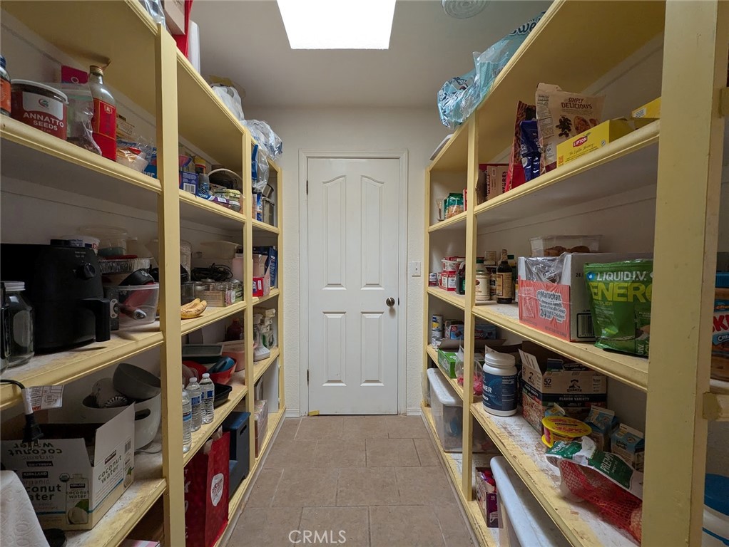 2304 Hutton Way Durham, CA 95938 - Photo 20 of 43 a view of walk in closet with clothes and shoes