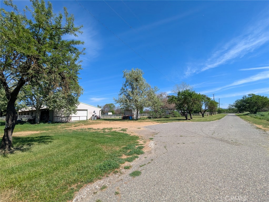 2304 Hutton Way Durham, CA 95938 - Photo 2 of 43 a big yard with large trees