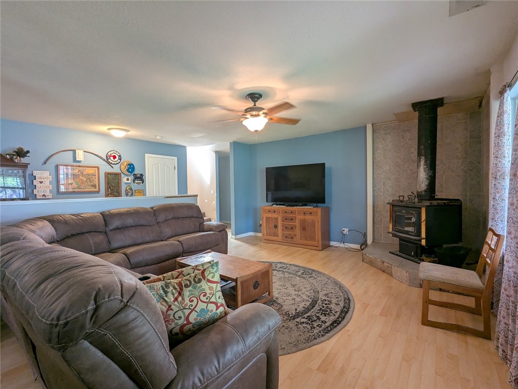 2304 Hutton Way Durham, CA 95938 - Photo 22 of 43 a living room with furniture and a flat screen tv