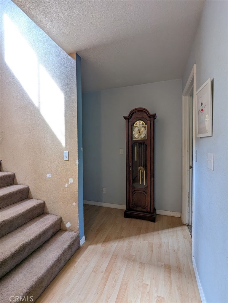 2304 Hutton Way Durham, CA 95938 - Photo 31 of 43 a view of an entryway with wooden floor and mirror