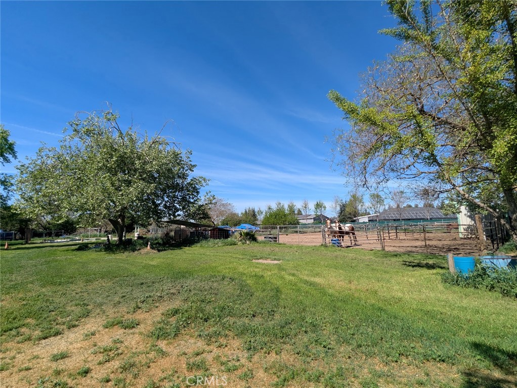 2304 Hutton Way Durham, CA 95938 - Photo 40 of 43 a view of a house with a yard and sitting area