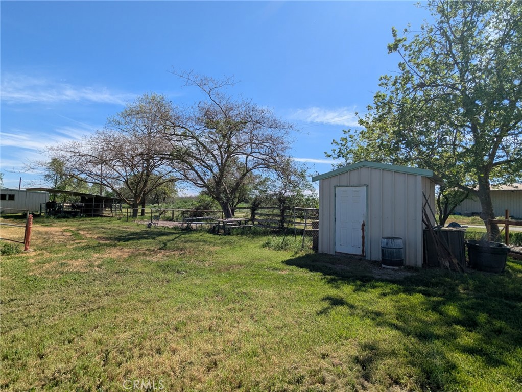 2304 Hutton Way Durham, CA 95938 - Photo 10 of 43 a view of a backyard with large trees