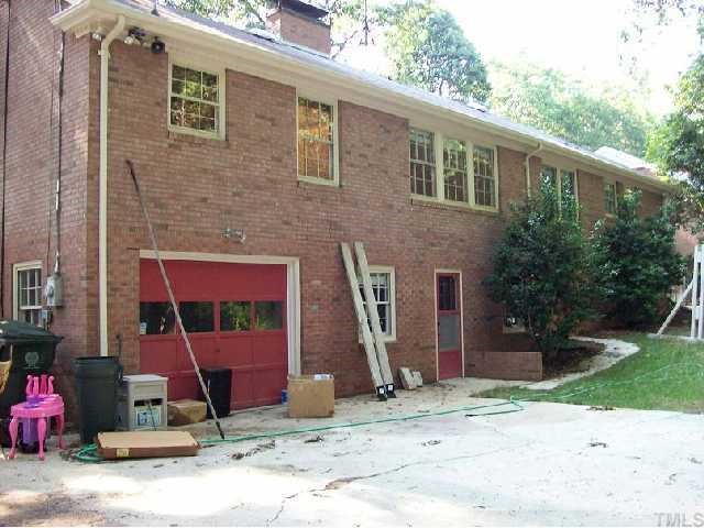 4810 Oak Park Road Raleigh, NC 27612 - Photo 12 of 12 back of home...seller is still in the process of transitioning and will have it cleaned up asap