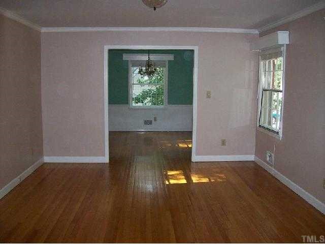 4810 Oak Park Road Raleigh, NC 27612 - Photo 3 of 12 Formal living room with hardwoods
