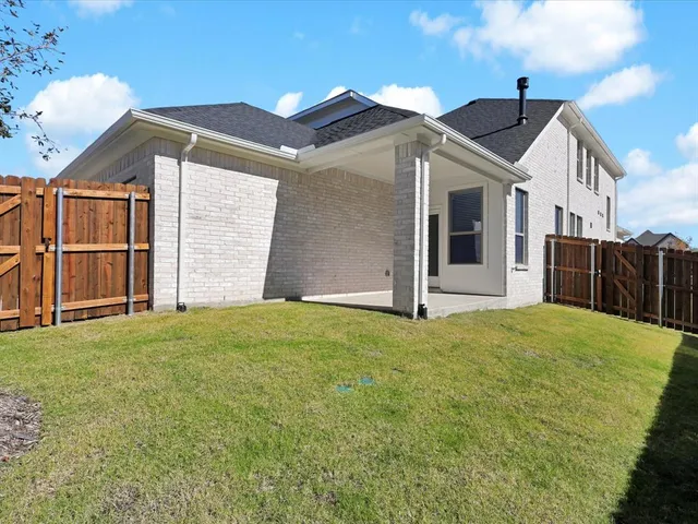 a view of a garden with a small yard