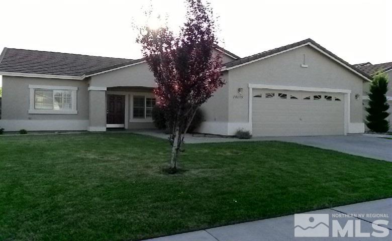 10195 Robilee Court Reno, NV 89521 - Photo 1 of 1 a house that is sitting in the grass
