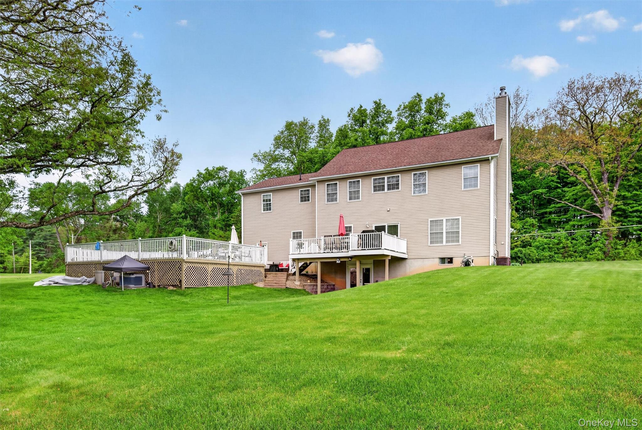 19 Pirog Road Pine Bush, NY 12566 - Photo 46 of 50 a view of a house with backyard and a tree