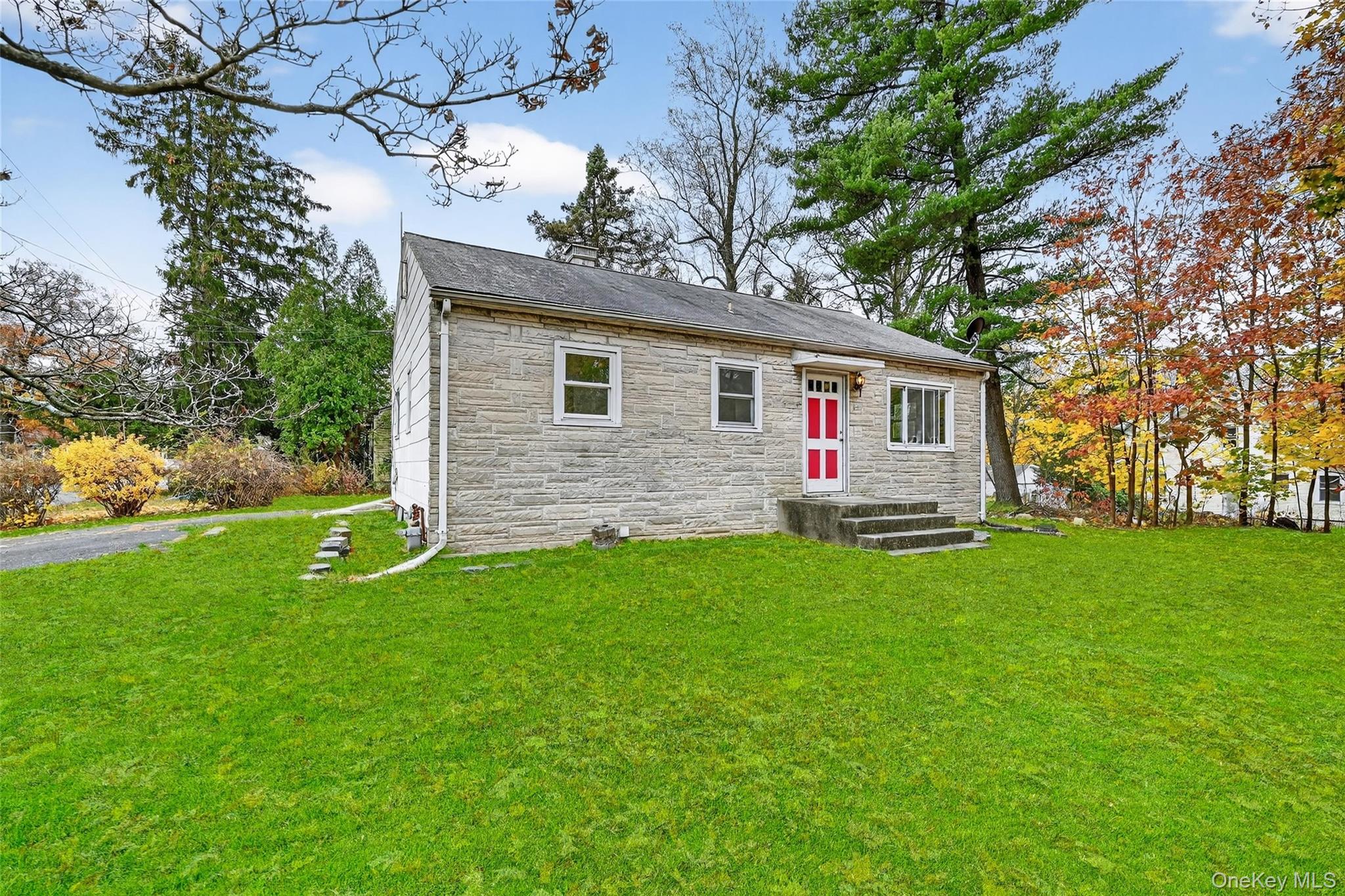 106 East Eckerson Road Spring Valley, NY 10977 - Photo 2 of 33 a front view of house with yard and green space