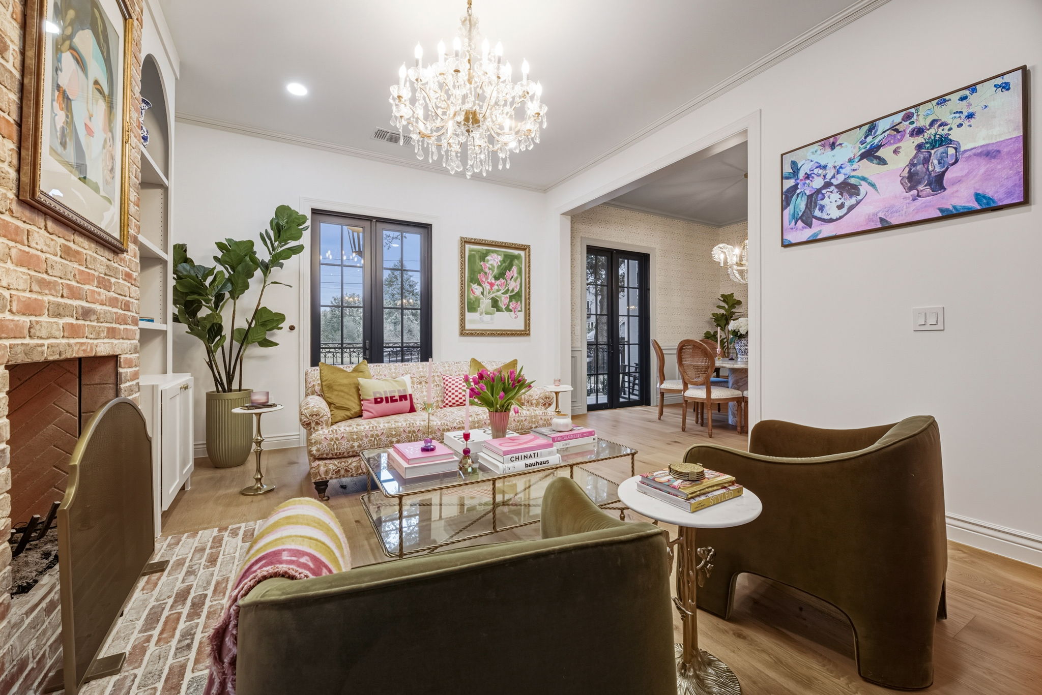 1804 South 6th Street Austin, TX 78704 - Photo 18 of 40 a living room with furniture and a chandelier
