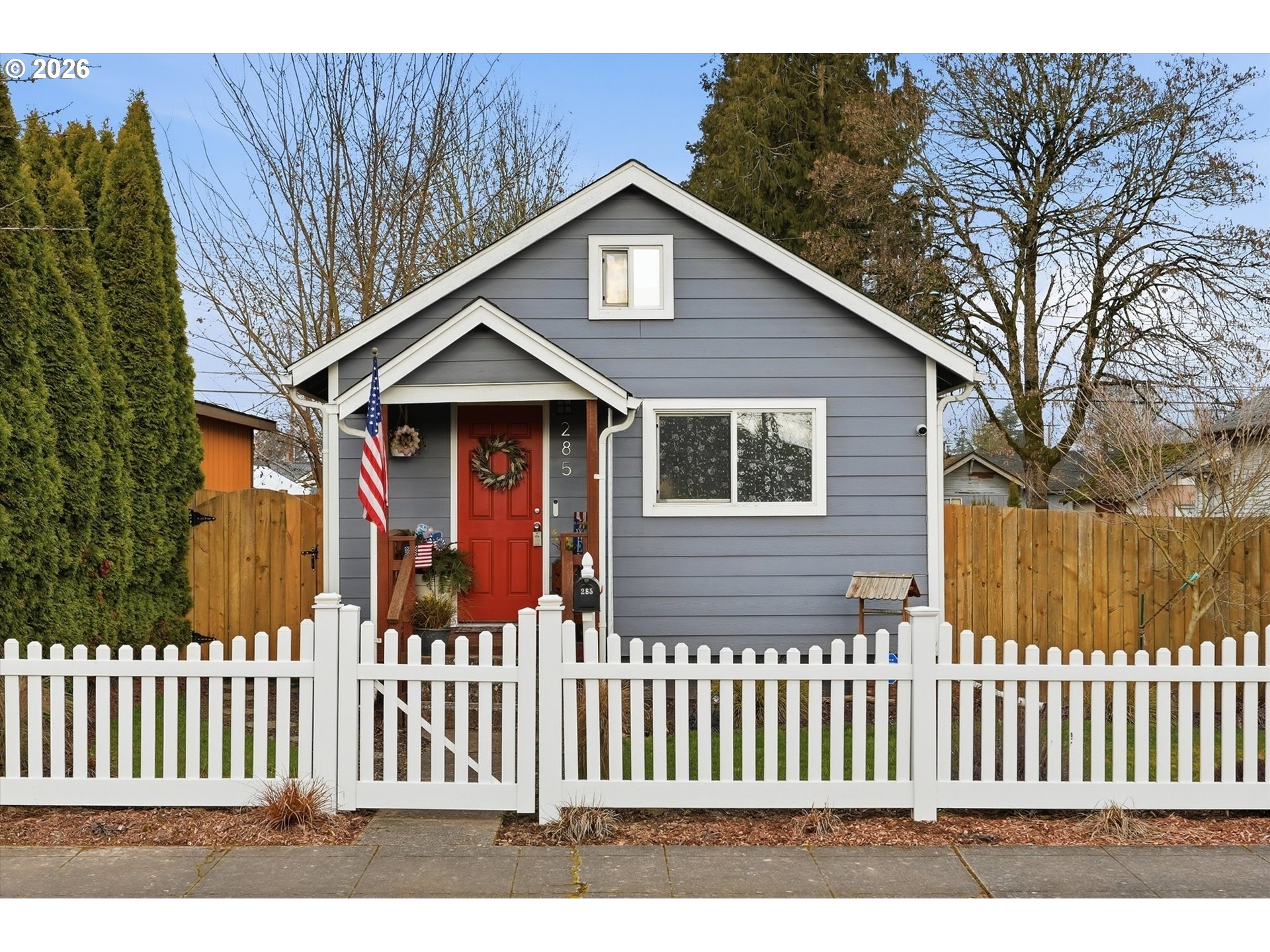 285 19th Avenue Longview, WA 98632 - Photo 1 of 27 a front view of a house with a garden