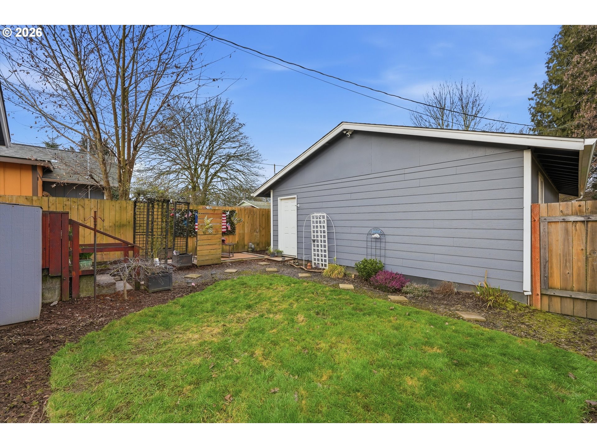 285 19th Avenue Longview, WA 98632 - Photo 26 of 27 a backyard of a house with table and chairs