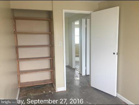 7929 Wynbrook Road Baltimore, MD 21224 - Photo 6 of 10 a view of a wooden door