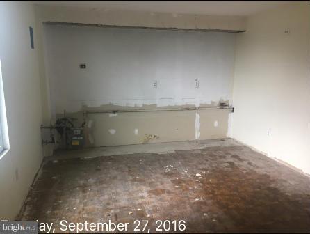 7929 Wynbrook Road Baltimore, MD 21224 - Photo 9 of 10 a view of water heater room