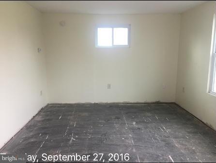 7929 Wynbrook Road Baltimore, MD 21224 - Photo 10 of 10 a view of an empty room and window