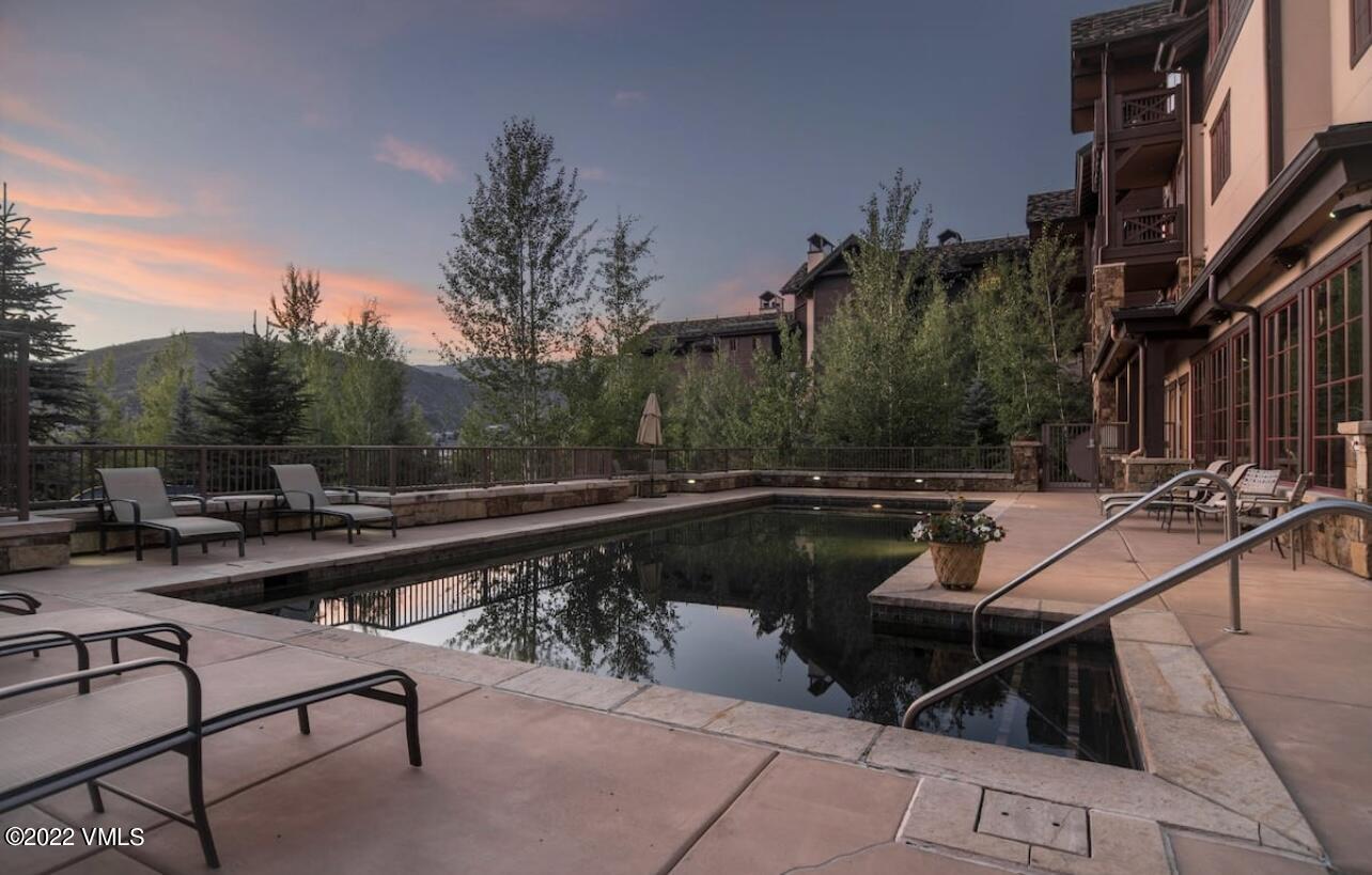 300 Prater Road, Unit B303 Beaver Creek, CO 81620 - Photo 30 of 38 a view of swimming pool having outdoor seating