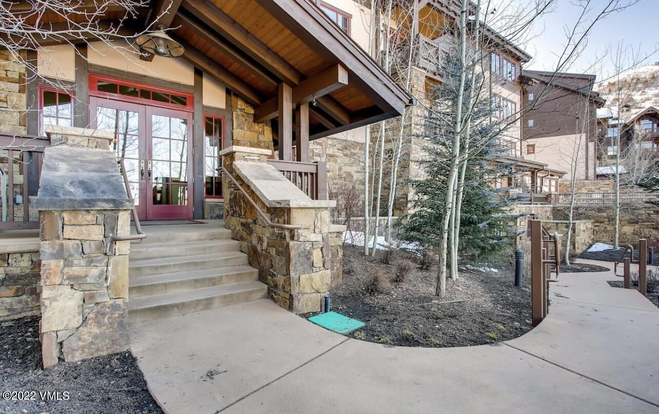 300 Prater Road, Unit B303 Beaver Creek, CO 81620 - Photo 34 of 38 a view of a building with a pathway