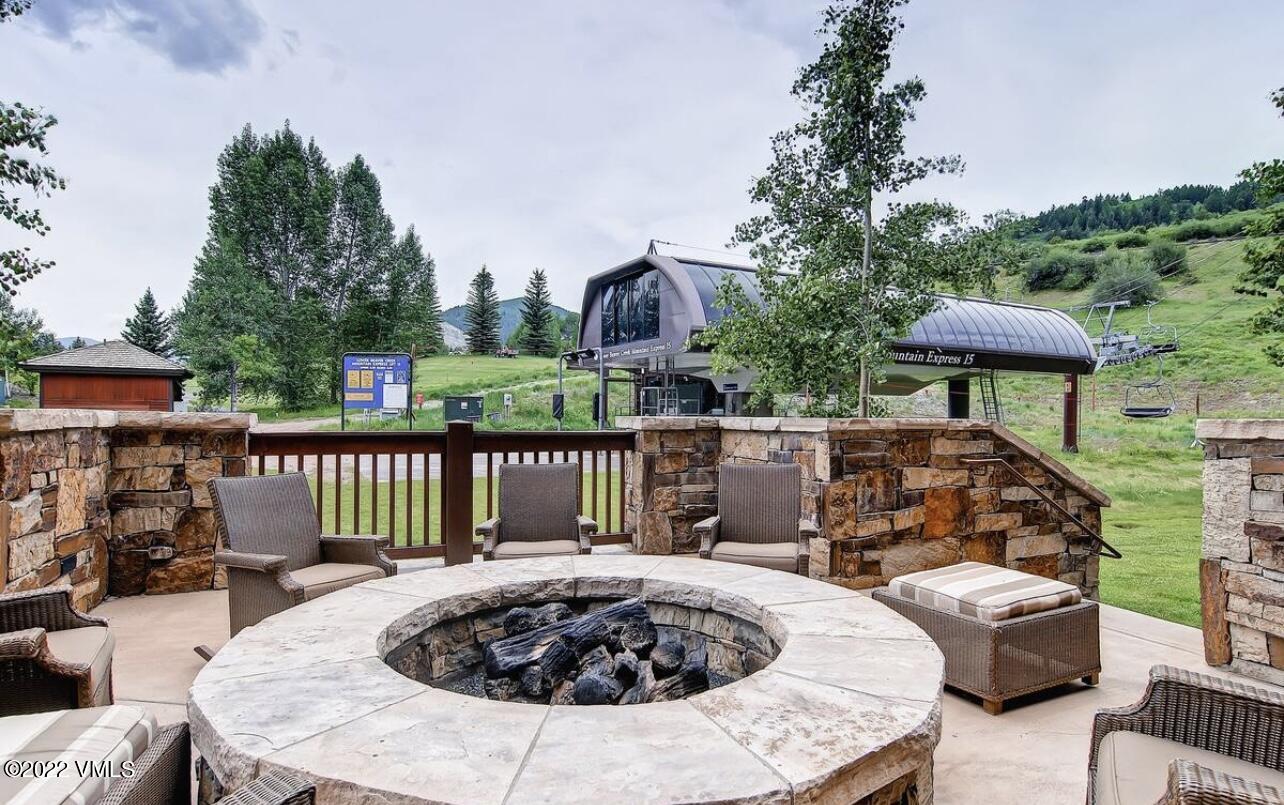 300 Prater Road, Unit B303 Beaver Creek, CO 81620 - Photo 36 of 38 a view of a patio with couches table and chairs and potted plants