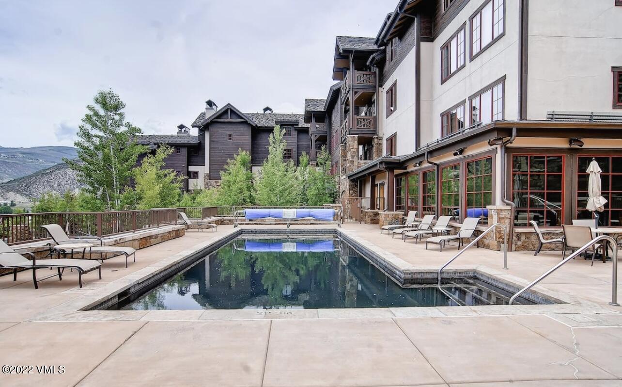 300 Prater Road, Unit B303 Beaver Creek, CO 81620 - Photo 38 of 38 a view of house with yard outdoor seating and barbeque oven