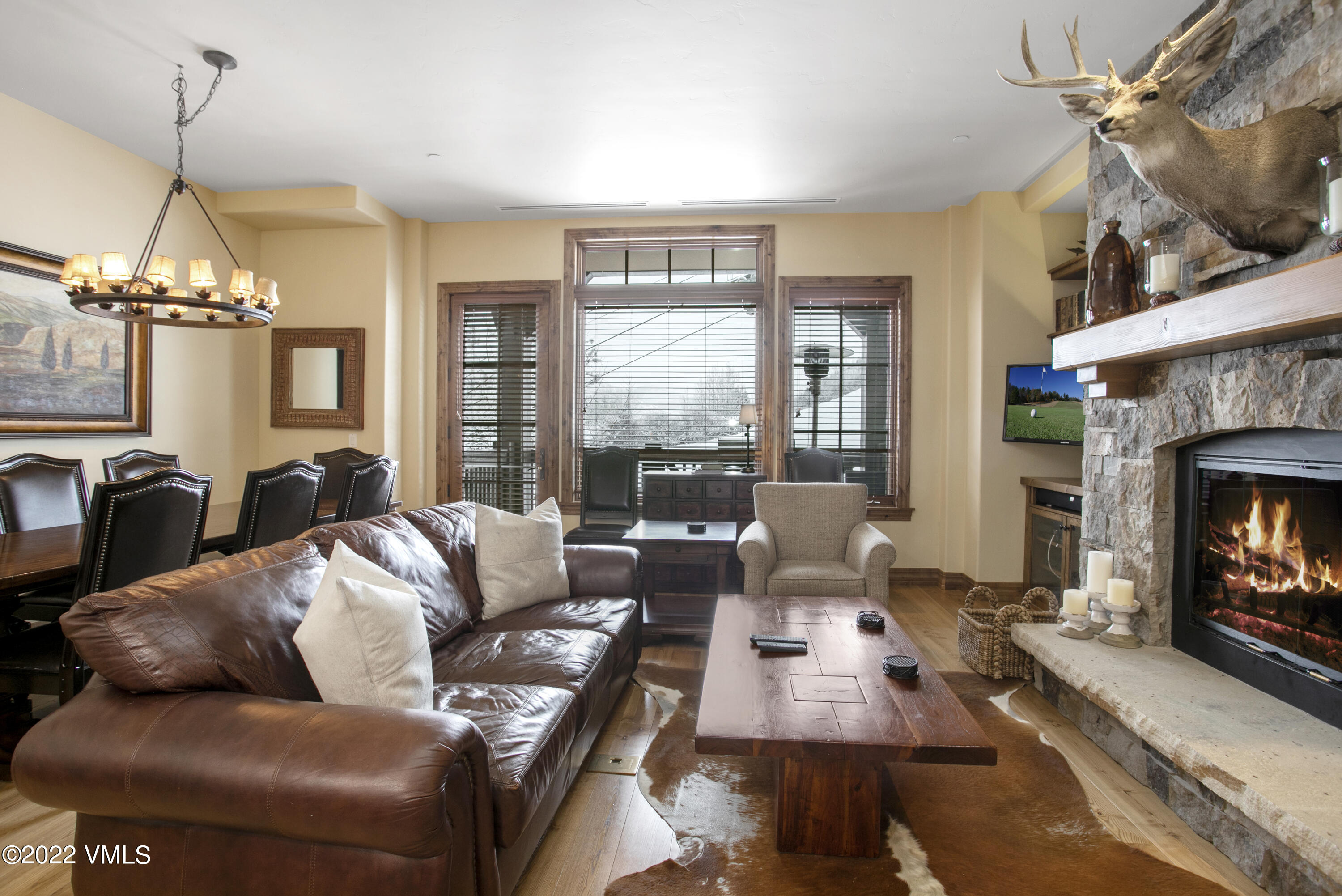 300 Prater Road, Unit B303 Beaver Creek, CO 81620 - Photo 4 of 38 a living room with furniture large window and fireplace