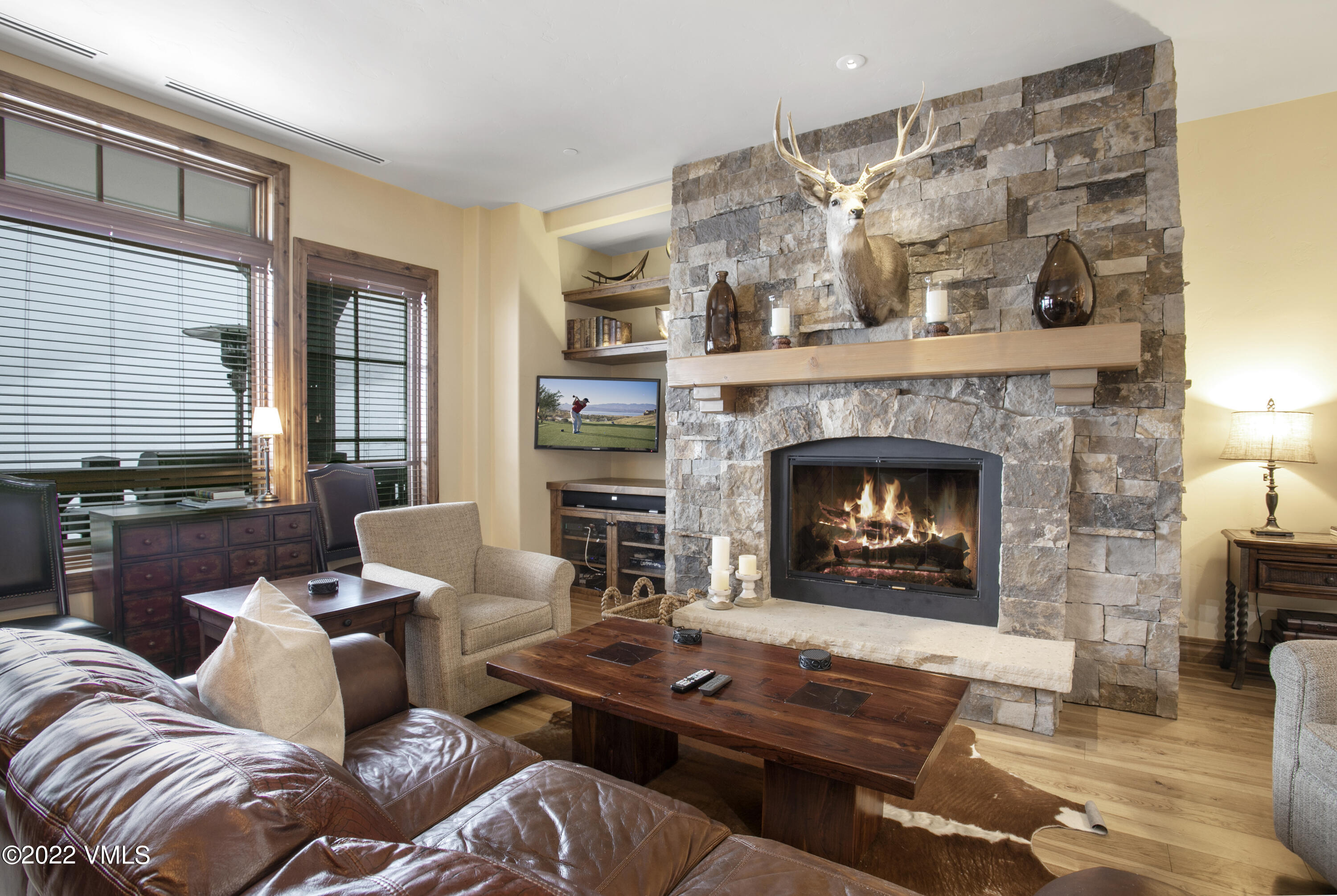 300 Prater Road, Unit B303 Beaver Creek, CO 81620 - Photo 7 of 38 a living room with furniture and a fireplace