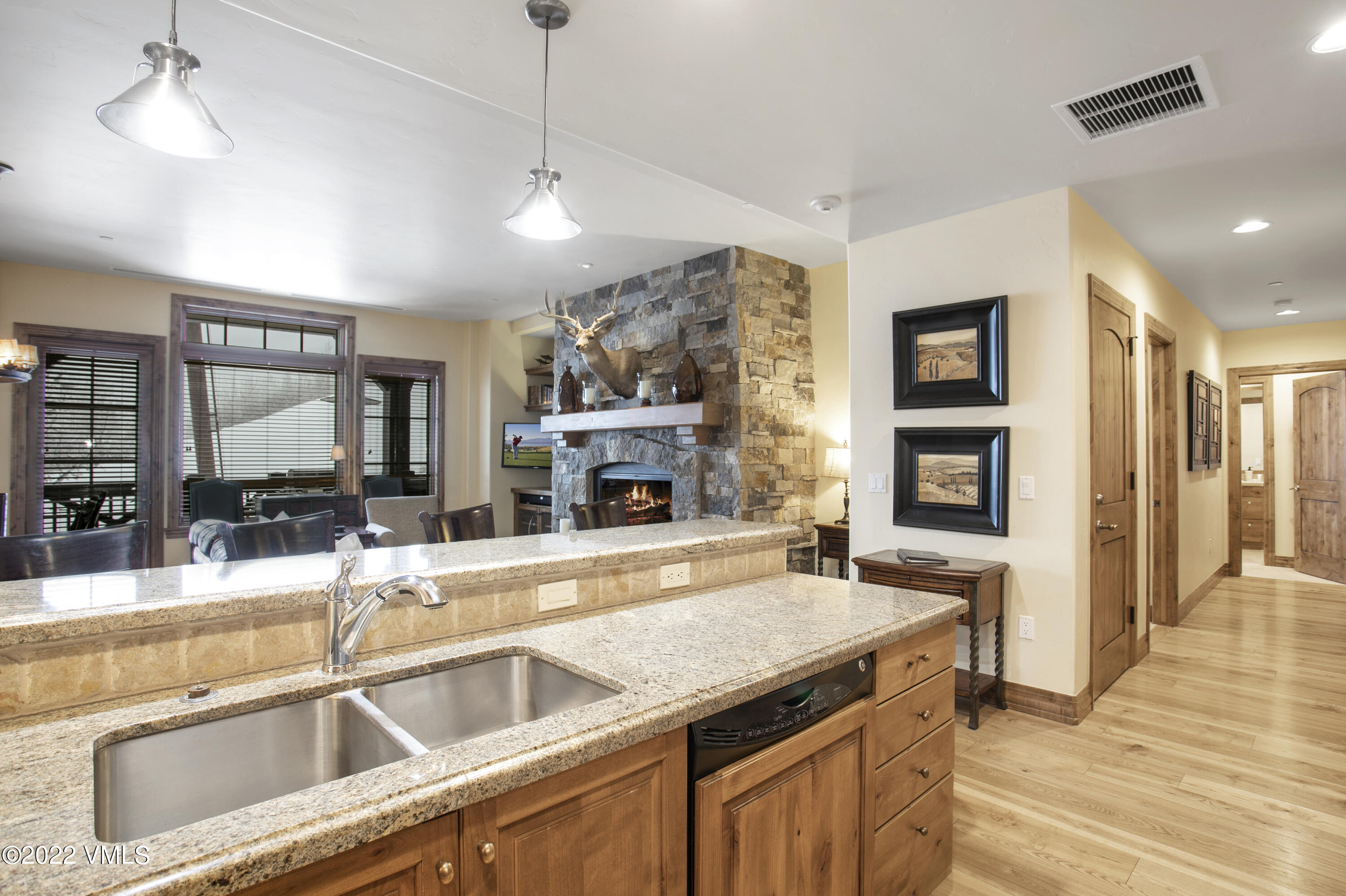 300 Prater Road, Unit B303 Beaver Creek, CO 81620 - Photo 10 of 38 a kitchen with stainless steel appliances granite countertop a sink and a refrigerator