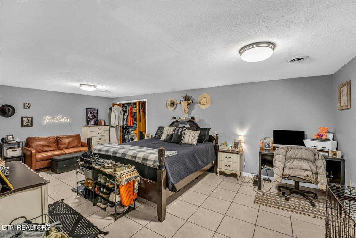 633 Sinking Springs Road Clinton, TN 37716 - Photo 14 of 40 14-Master Bedroom A1