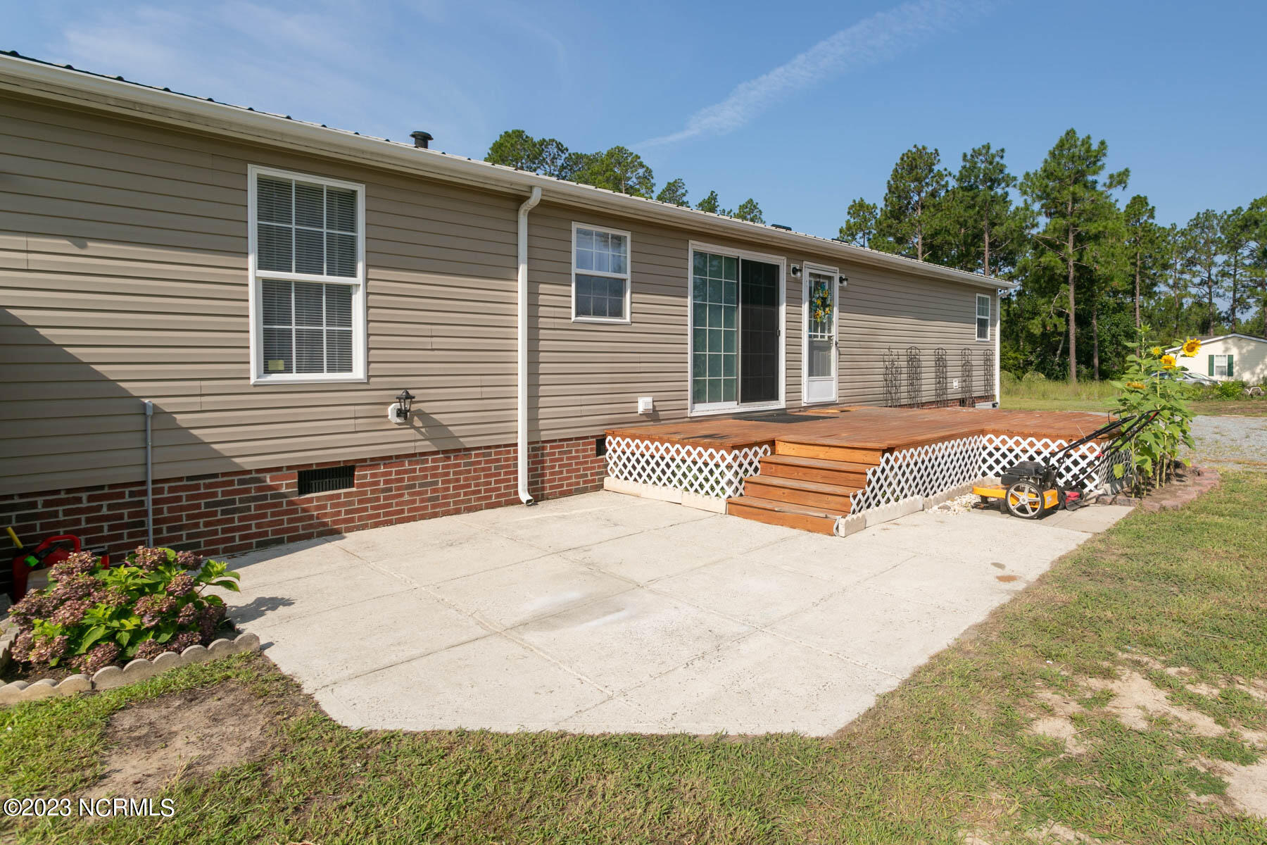 50 Forest Drive Cameron, NC 28326 - Photo 22 of 27 back patio-deck