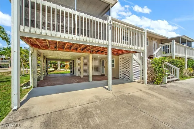 a view of a building with a porch