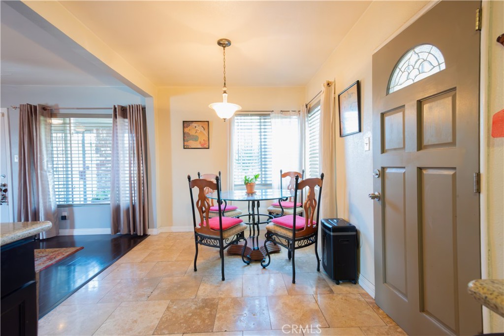 1500 West 156th Street Compton, CA 90220 - Photo 11 of 32 a view of a dining room with furniture window and wooden floor
