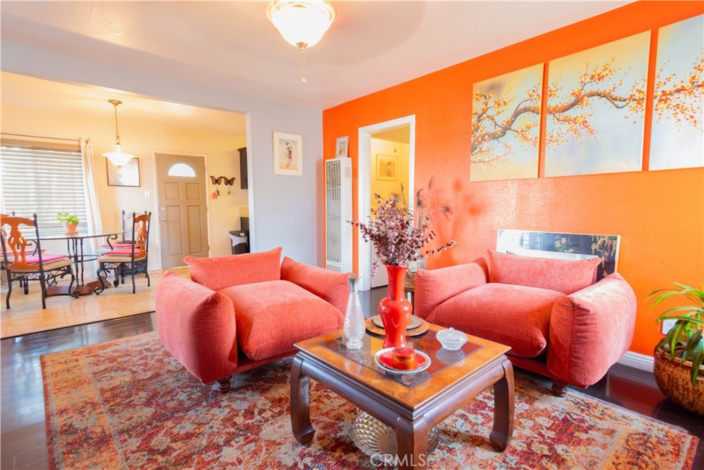 1500 West 156th Street Compton, CA 90220 - Photo 13 of 32 a bedroom with furniture and a large window