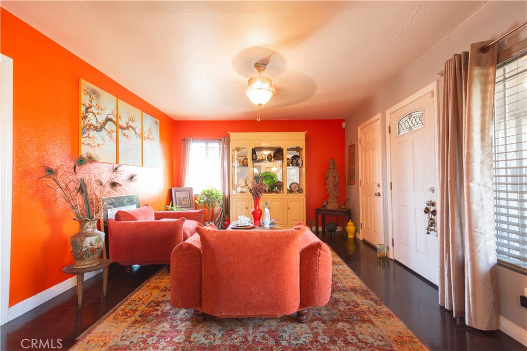 1500 West 156th Street Compton, CA 90220 - Photo 14 of 32 a bed room with a bed and a couch