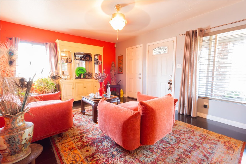 1500 West 156th Street Compton, CA 90220 - Photo 15 of 32 a living room with furniture and a large window