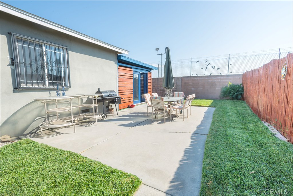 1500 West 156th Street Compton, CA 90220 - Photo 7 of 32 a view of a house with backyard porch and patio