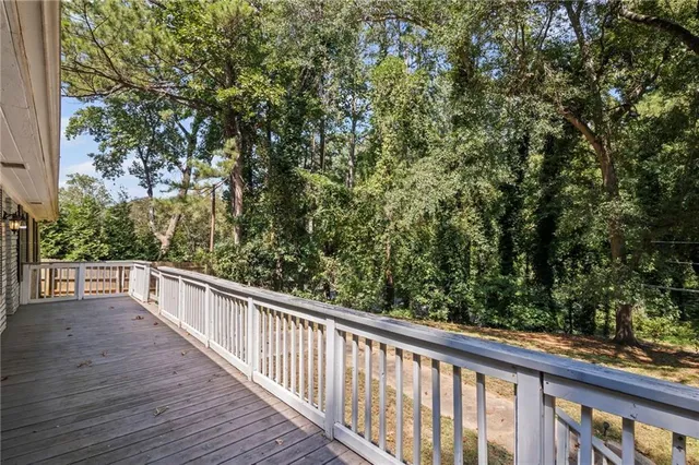 a view of balcony and yard