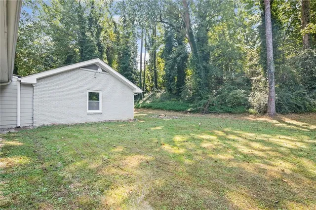 a view of a backyard with a garden