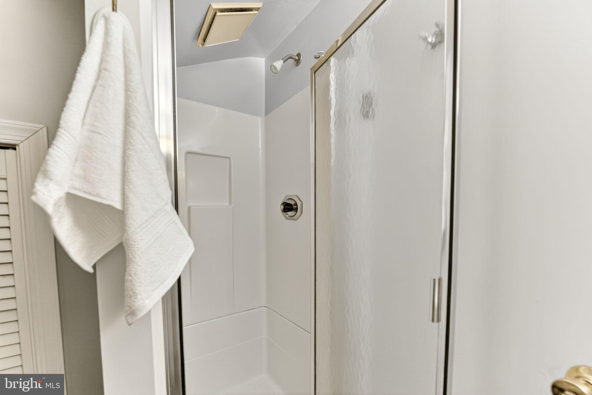 616 Bondsville Road Downingtown, PA 19335 - Photo 27 of 43 a bathroom with a shower and a glass door